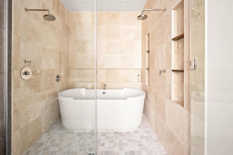 Primary bath with freestanding soaking tub at 76 Madison Avenue PH1, NoMad — photo 8 of 8