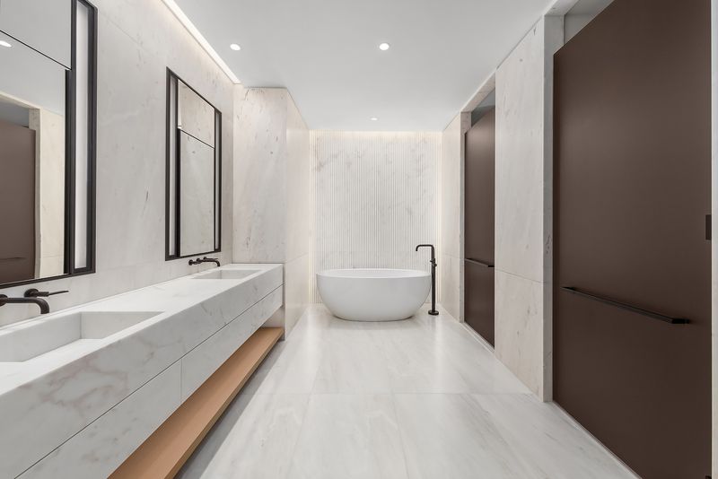 Primary bath with freestanding soaking tub at 760 Madison Avenue, Ninth Floor, Lenox Hill — photo 4 of 6