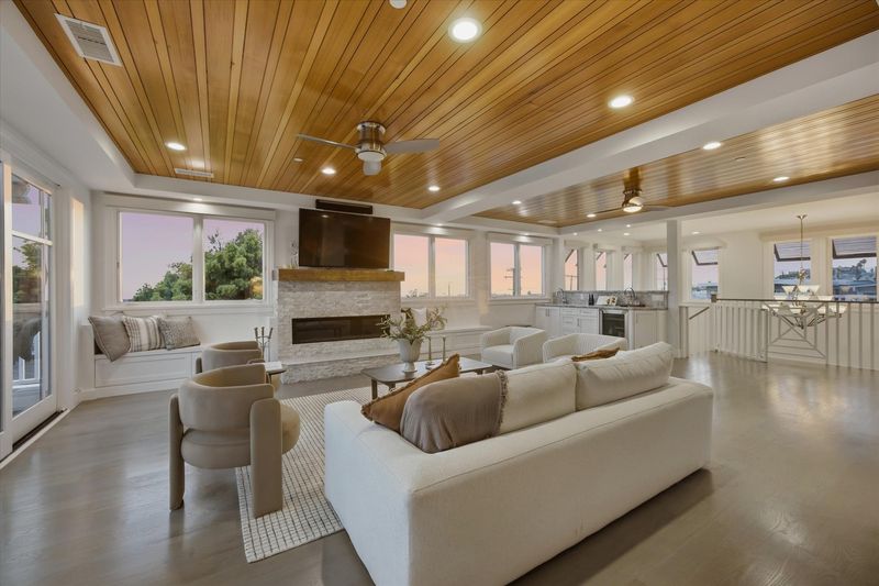 Open living level with deck access at 826 18th Street, Hermosa Beach — photo 8 of 8