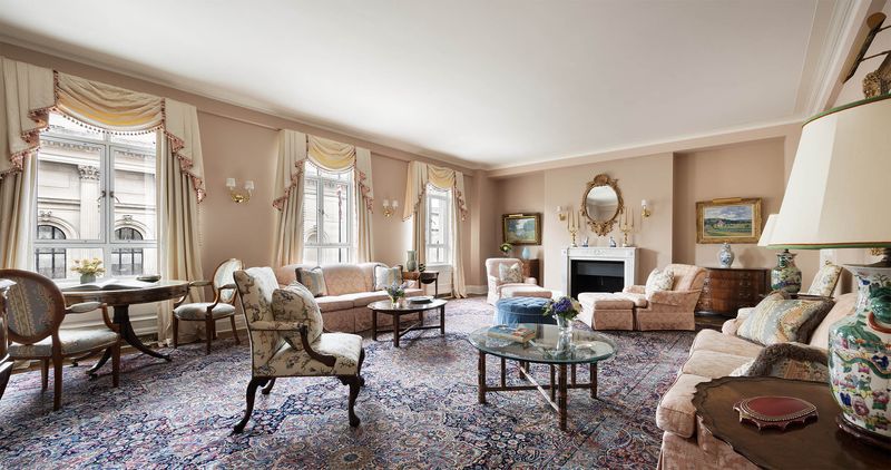 Grand living room with fireplace and park-side windows at 993 Fifth Avenue, Residence 4, Upper East Side