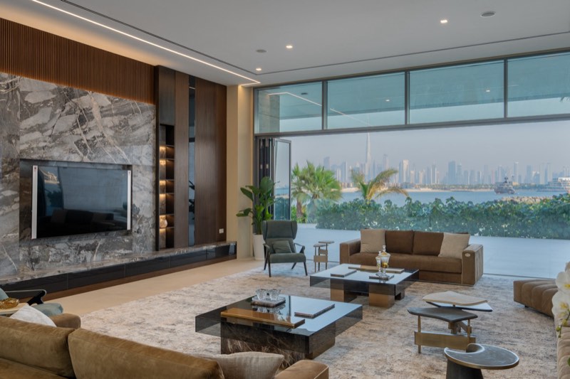 living / marble TV wall / Burj Khalifa through glass